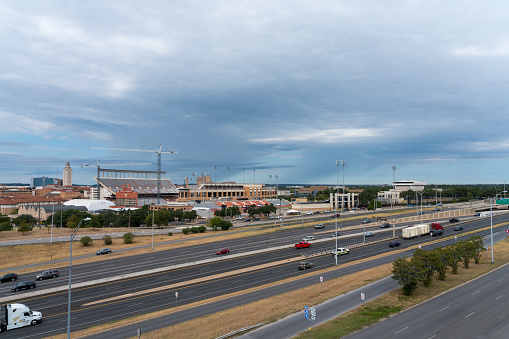 Austin, Texas: October 2019: Aerial View of The UT Longhorn Football Stadium under renovations With IH-35 in the foreground