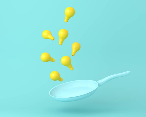 istock Yellow light bulb floating with blue pan on pastel blue background. minimal idea concept. 1192216533