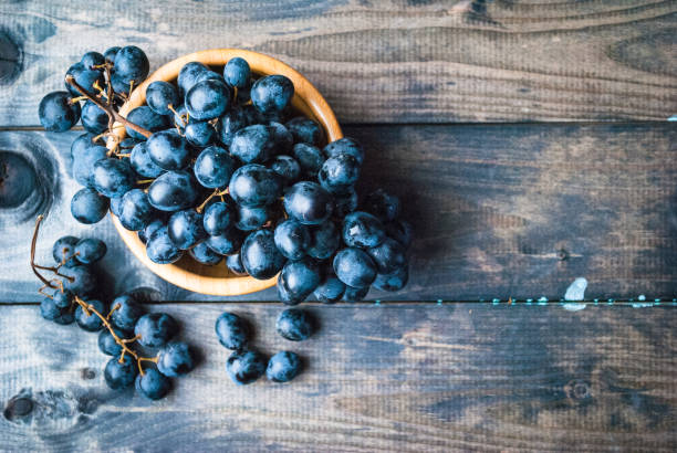 istock Bunch of black grapes 1192220711
