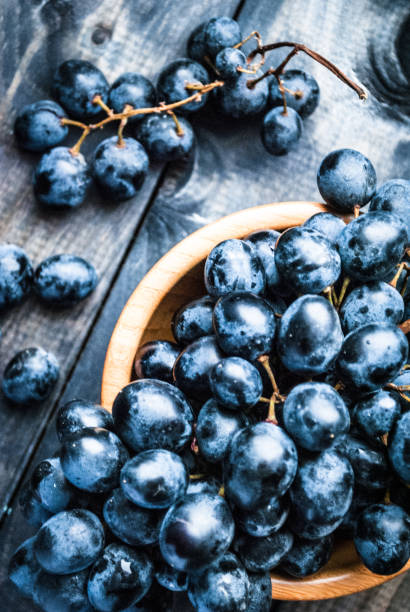 istock Bunch of black grapes 1192220836