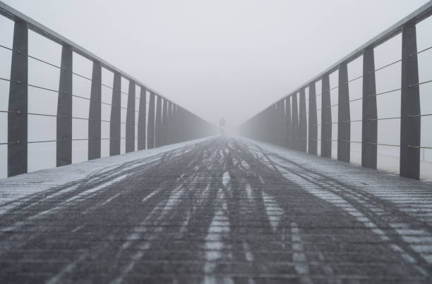 istock Small bridge in the fog 1192227294