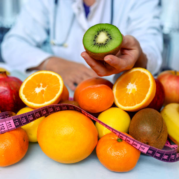istock Doctor holding kiwi 1192234852