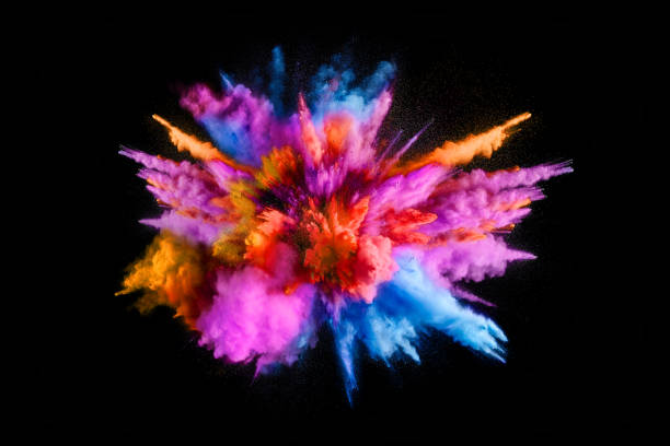 explosion of colored powder on black background - colorido imagens e fotografias de stock