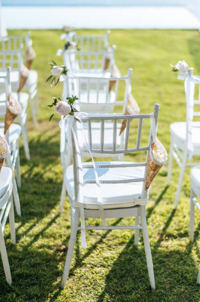 istock Chair decorated with flowers in Wedding ceremony. 1192241828