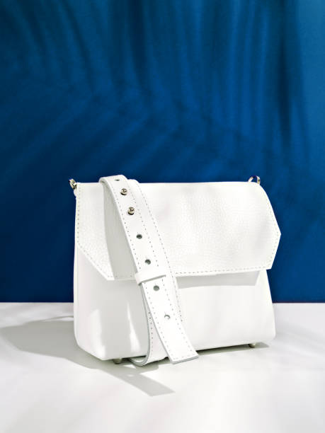 istock Trendy white cross body handbag. 1192243111