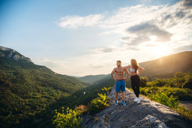 istock Fitness couple high on mountain 1192248296
