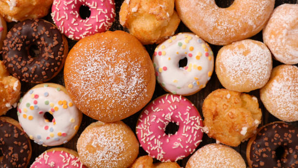 istock collection of donut with various icing- top view 1192249985