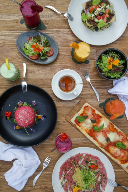 istock Various healthy vegetarian dishes served on the restaurant table 1192250290