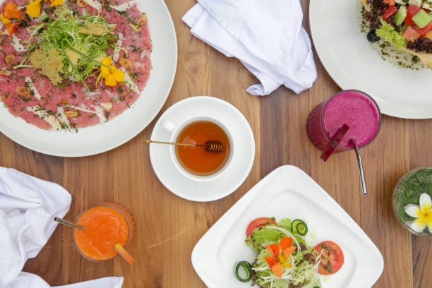 istock Various healthy vegetarian dishes served on the restaurant table 1192251127