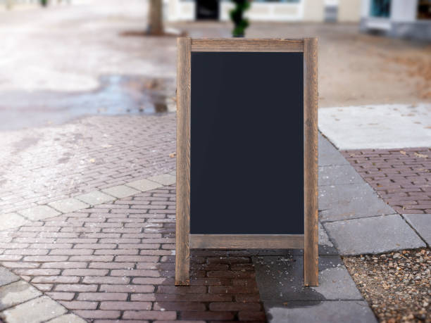 istock A-board with blank black board with wooden frame outside 1192251591