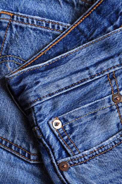 istock Denim jeans texture or denim jeans background with old torn. 1192258814