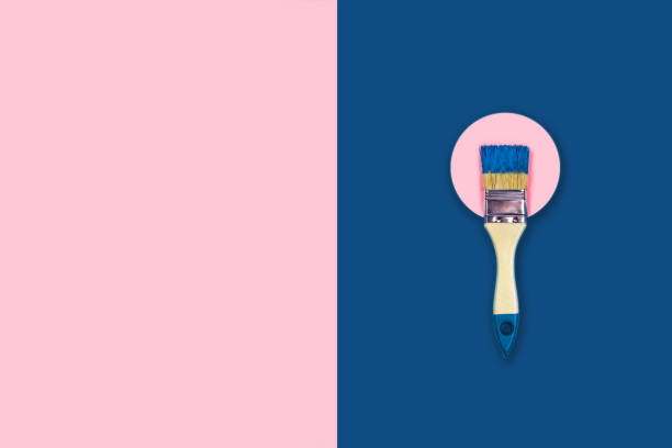 istock Colored background with paint brush on a can. 1192259278