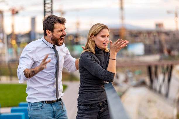 istock Young Woman is Arguing with his Boyfriend and Trying to Solve Problems 1192261244