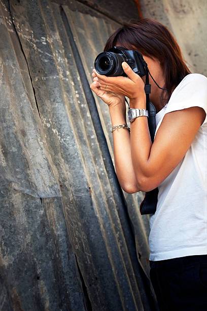 Woman Photographing. Color Image