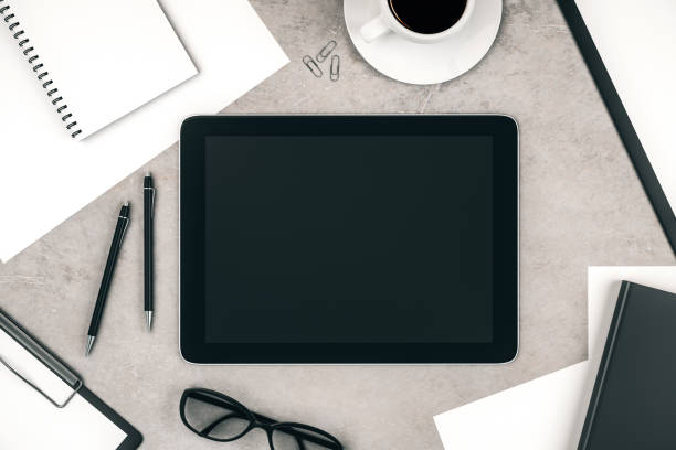 istock Topview of desktop with tablet 1192263051