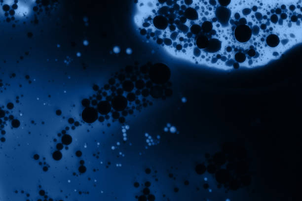 istock abstract background with streaks and spots in blue 1192264941