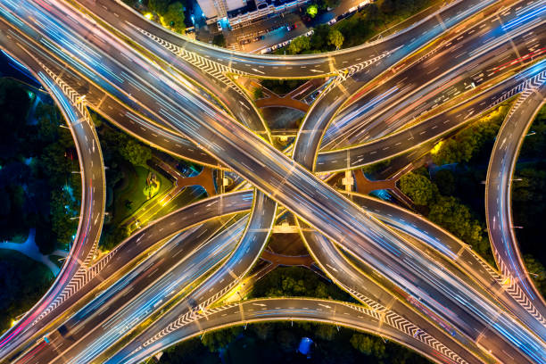 istock Urban highway traffic at night 1192270300