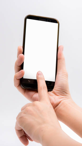 istock Cropped Hands Of Woman Using Blank Phone Against White Background 1192273390