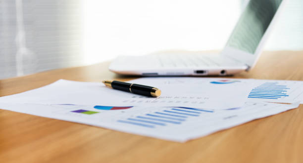 istock Close up view of an office desk 1192275239