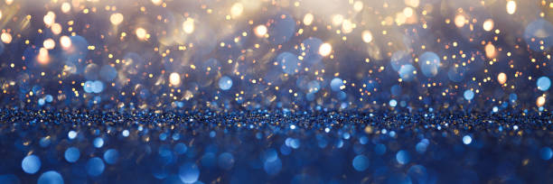 istock Vintage lights background. Gold lights and blue glitter. defocused 1192276549