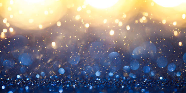 istock Vintage lights background. Gold lights and blue glitter. defocused 1192276786