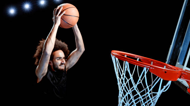 istock Young man playing basketball 1192278880