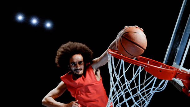 istock Young man playing basketball 1192278882