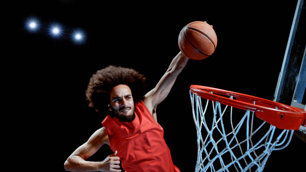 istock Young man playing basketball 1192278884