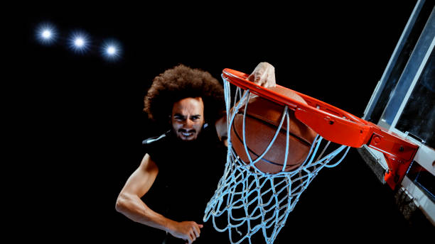istock Young man playing basketball 1192278889