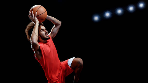 istock Young man playing basketball 1192278895