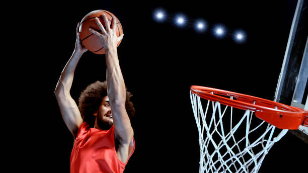 istock Young man playing basketball 1192278897
