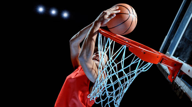 istock Young man playing basketball 1192278903