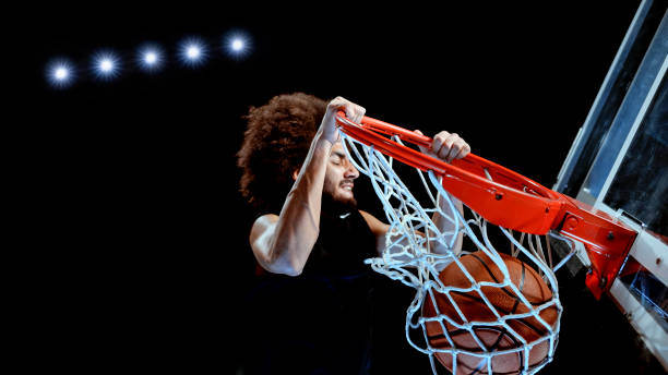 istock Young man playing basketball 1192278908