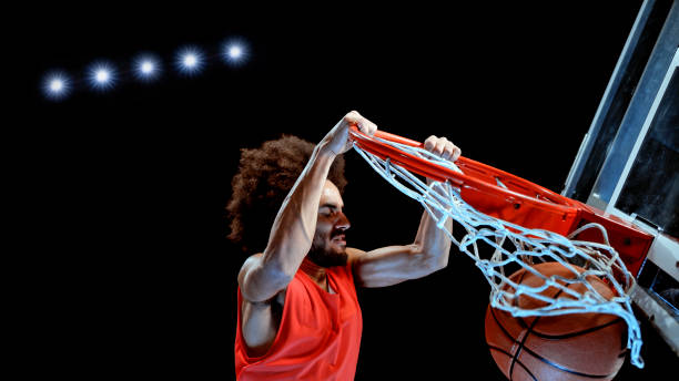 istock Young man playing basketball 1192278910