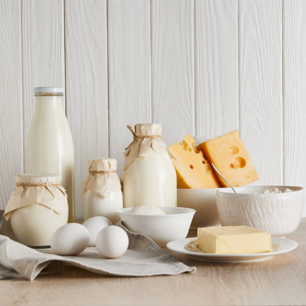 istock delicious fresh dairy products and eggs on white wooden background 1192279201