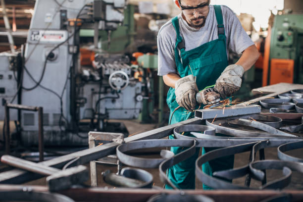 istock Man grinder working in factory workshop 1192281555