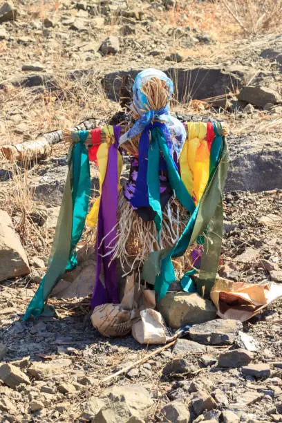 Photo of A traditional Russian folk scarecrow made on Maslenitsa (Shrovetide) celebration for burning on a fire.