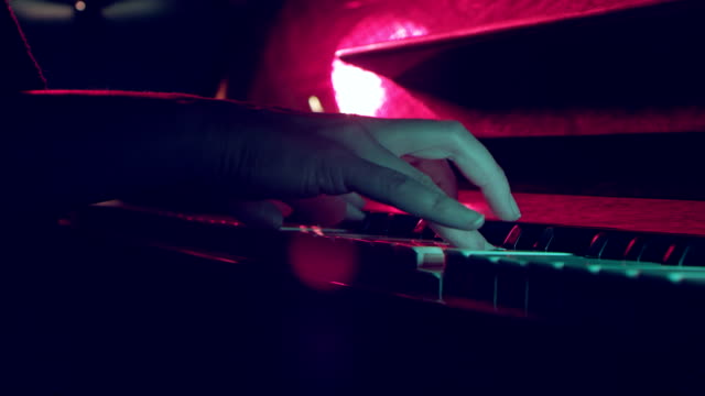 Close up of woman hands classic piano playing