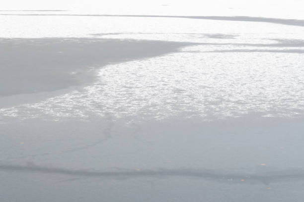 istock Frozen pond or small lake covered with snow in winter 1192287393