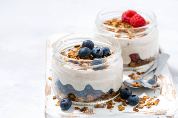 istock healthy creamy dessert with berries, closeup 1192290715