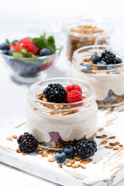 istock healthy creamy dessert with fresh berries on white cutting board 1192290873