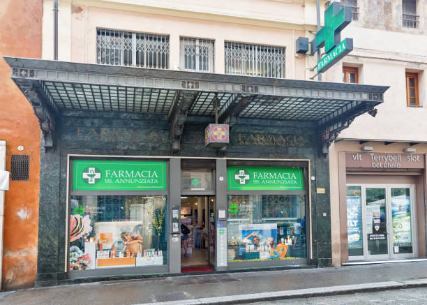 Pharmacy SS. Annunziata facade in Bologna, Italy. Bologna, Italy- July 10, 2019: Pharmacy SS. Annunziata facade on Orefici street in city historic center. Bologna is the seventh most populous city in Italy. farmacia stock pictures, royalty-free photos & images