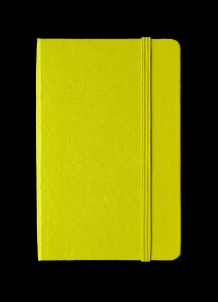 istock Lime green closed notebook isolated on black 1192291091