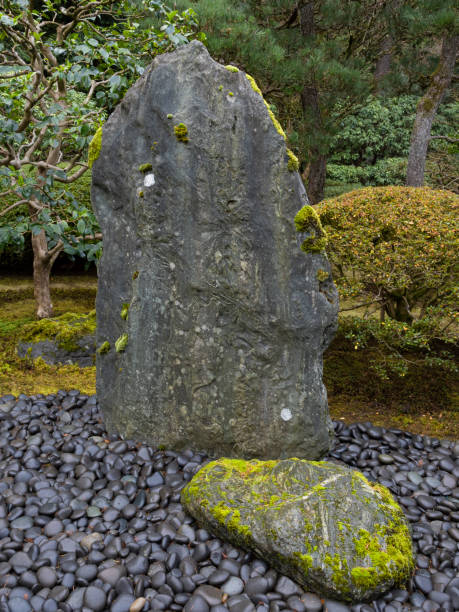 Stone Boulder Japanese Garden Portland Oregon A rock boulder display in the Portland Japanese Garden. This is downtown Portland, Oregon area and taken from the Portland Japanese Garden. I am a Photographer level member of the Portland Japanese Garden as required by the Garden for Commercial use of photos. portland japanese garden stock pictures, royalty-free photos & images