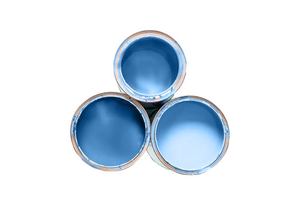 istock Three cans filled paint of classic blue color isolated on white background. 1192292440
