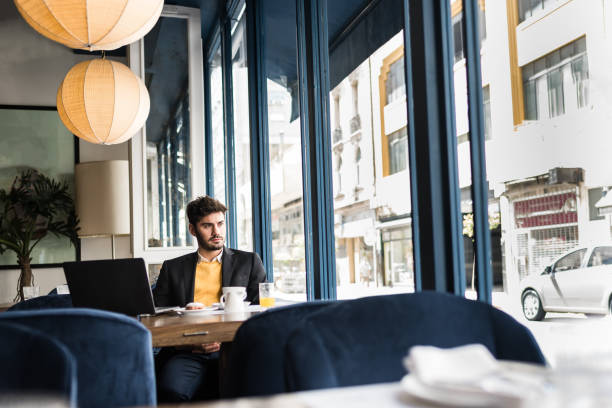istock Thoughtful businessman in the cafe 1192295027