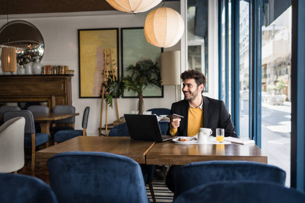 istock Businessman in the cafe 1192295044