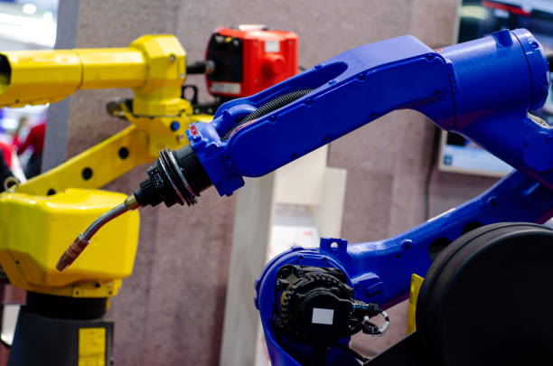 istock Close-up of industrial robot arm. 1192299043