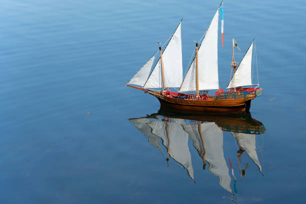 Galleon boat Wooden toy galleon ship sailing in a lake toy boat stock pictures, royalty-free photos & images