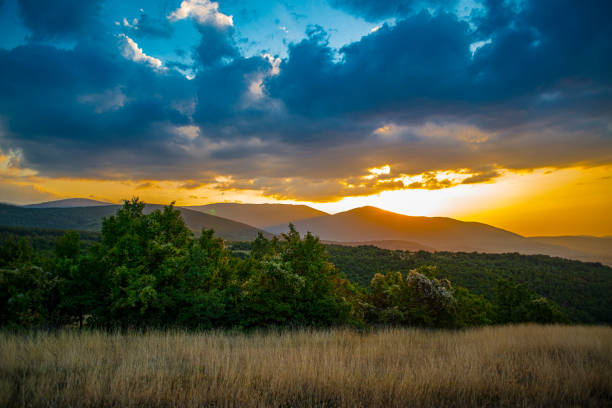 The sunset above the mountain landscape\